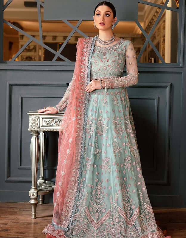 ''Model wearing an elegant pastel mint green embroidered bridal alnas outfit''