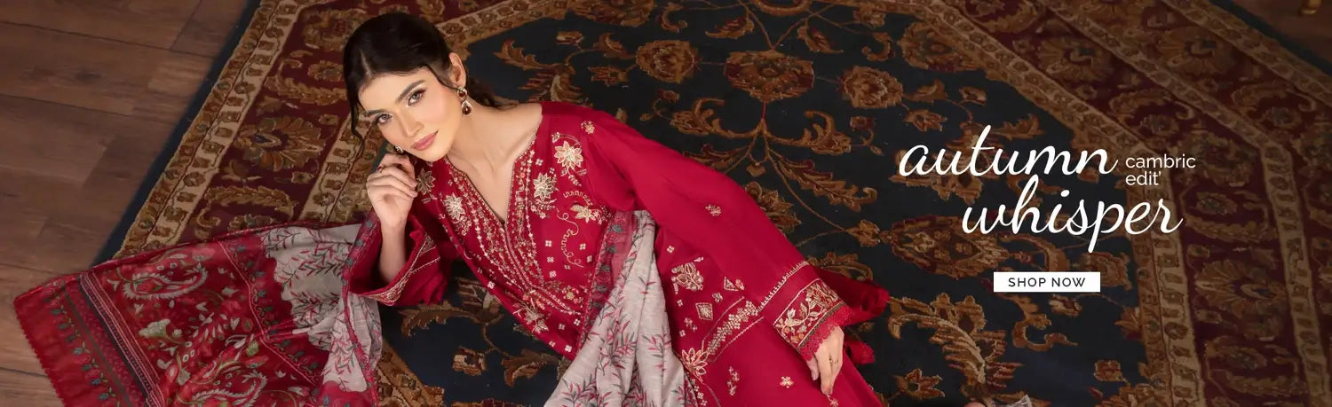 Woman in a red embroidered outfit on a patterned rug with 'autumn whisper' text.